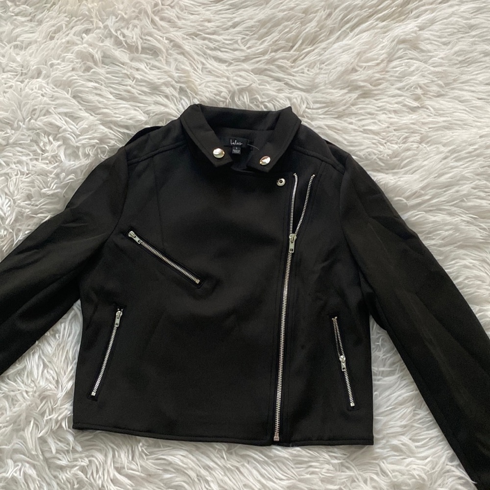 Brand new never worn with tags! Black jacket. Beautiful style.